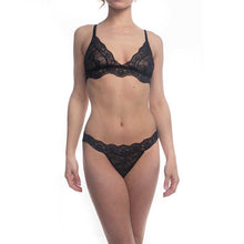 Load image into Gallery viewer, Model facing forward wearing Fantasia lace thong and bralette in black sand.