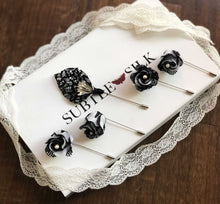 Load image into Gallery viewer, Group of lace lapel pins on Subtle Silk box 4 rosebud lapel pins and one calla lily pin.