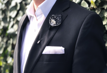 Load image into Gallery viewer, Model wearing black lace and pearl center lapel pin in front of garden.